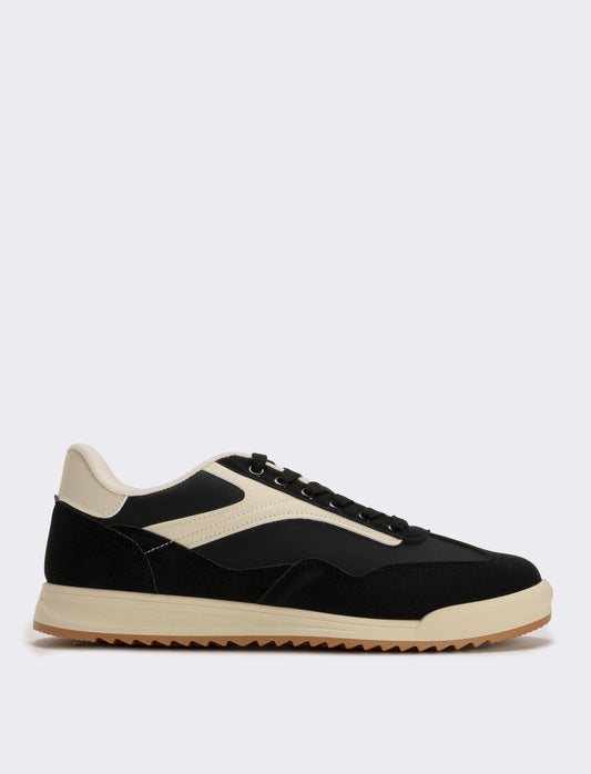 Sneakers nere in poliuretano con dettagli bianchi - Nero