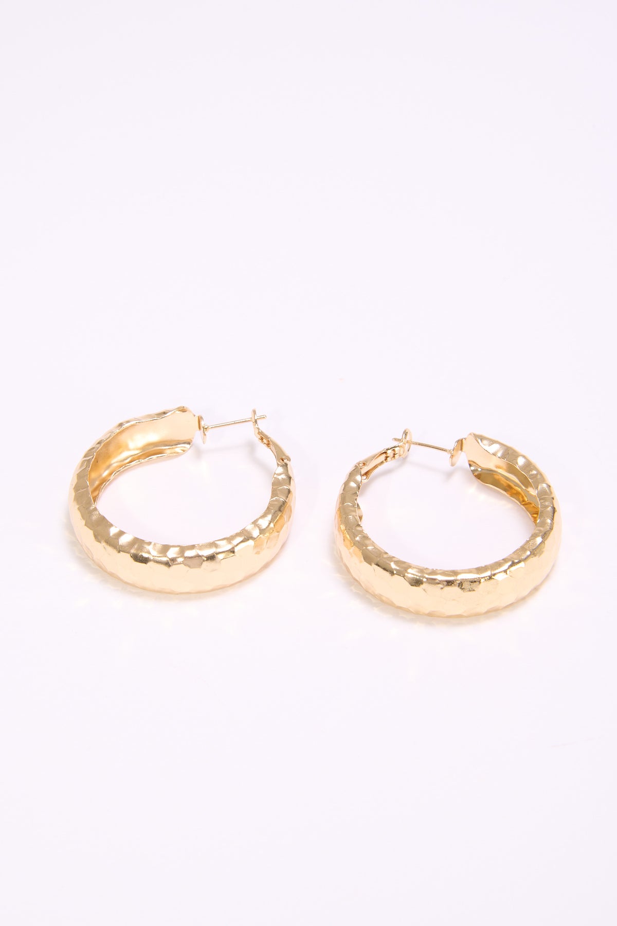 Orecchini donna cerchi martellati - Oro