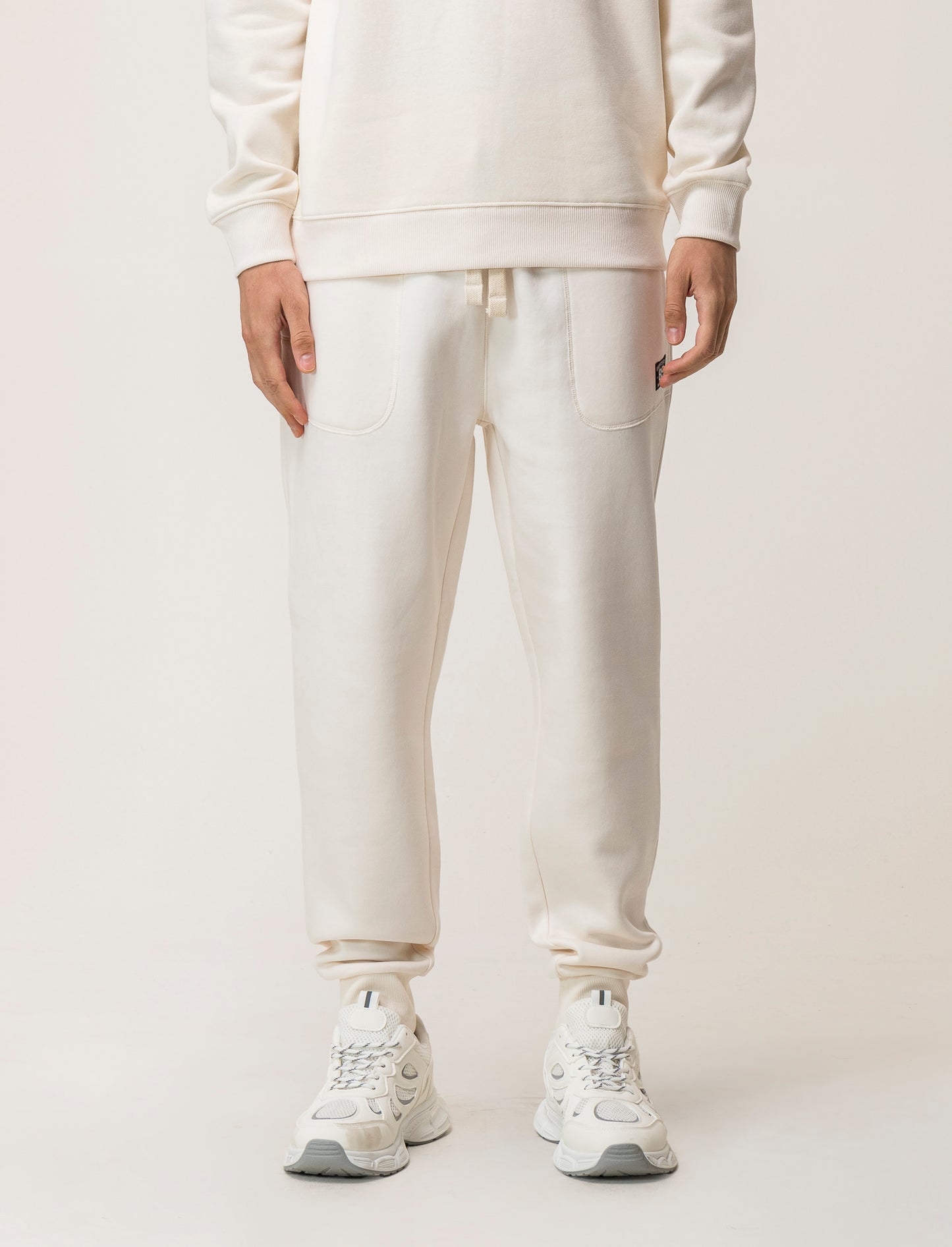 Pantaloni in felpa in misto cotone garzato relaxed fit - Bianco latte