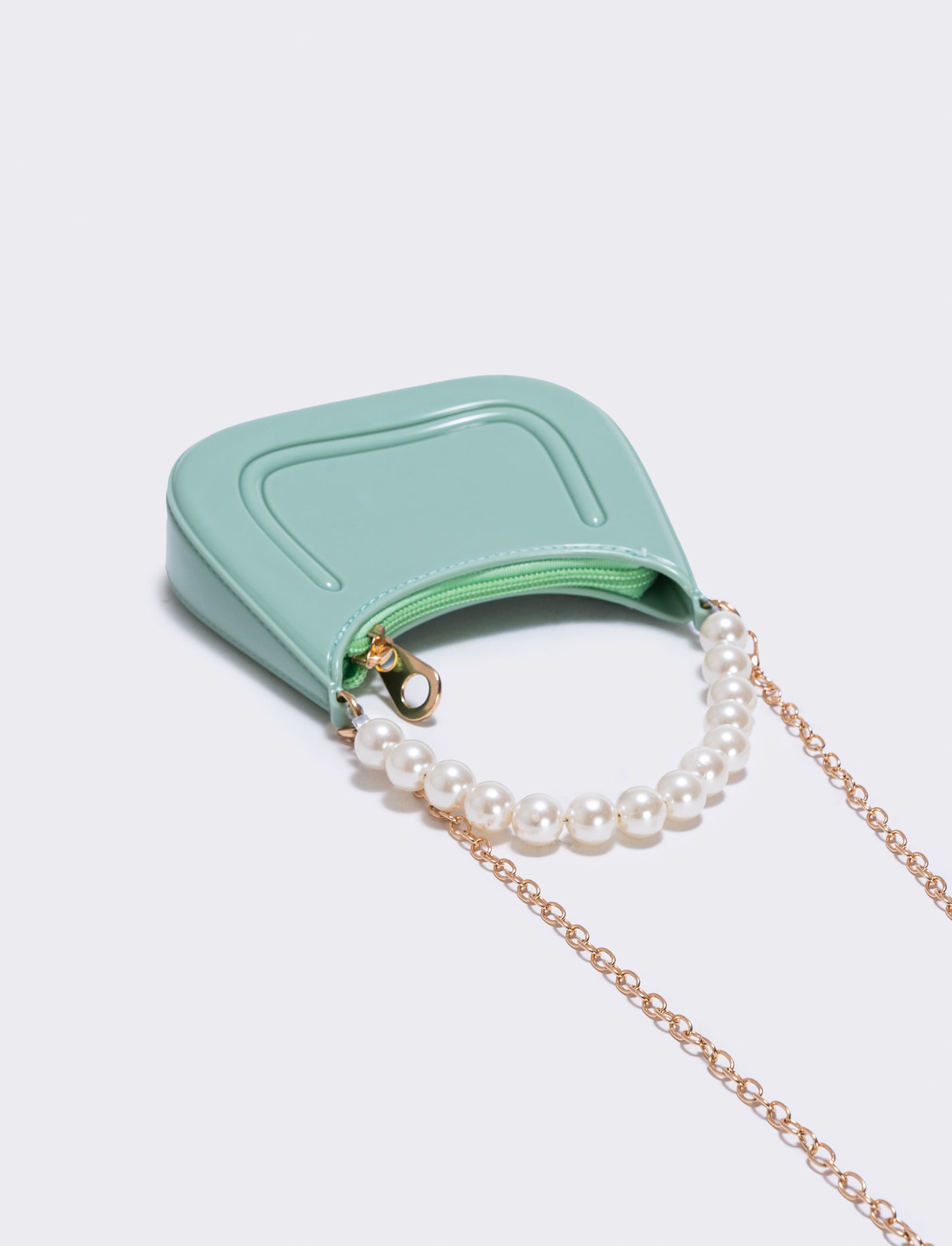 Bag with handle and elegant pearls - Green